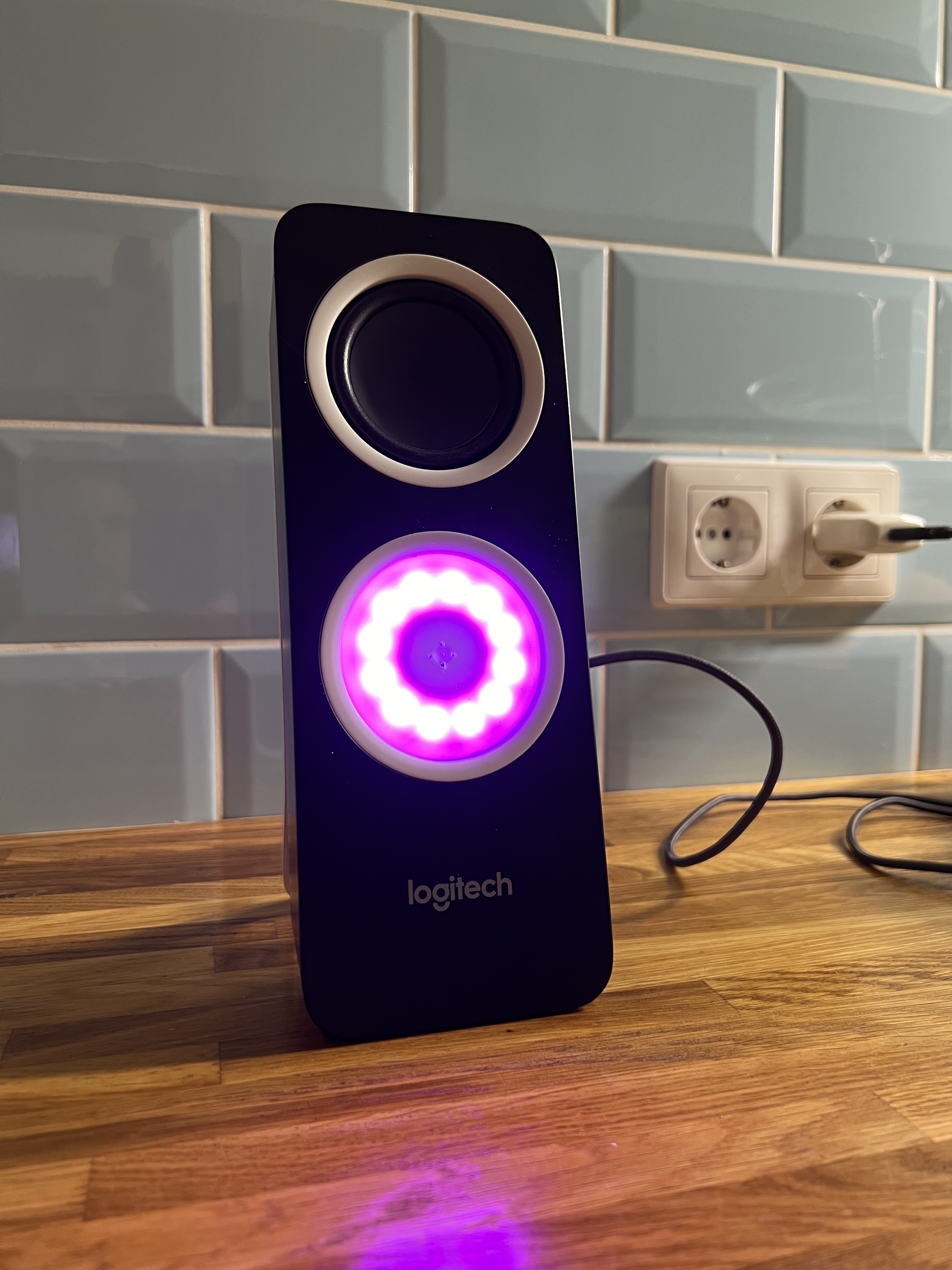 ESP32 voice assistant prototype built into a Logitech PC speaker