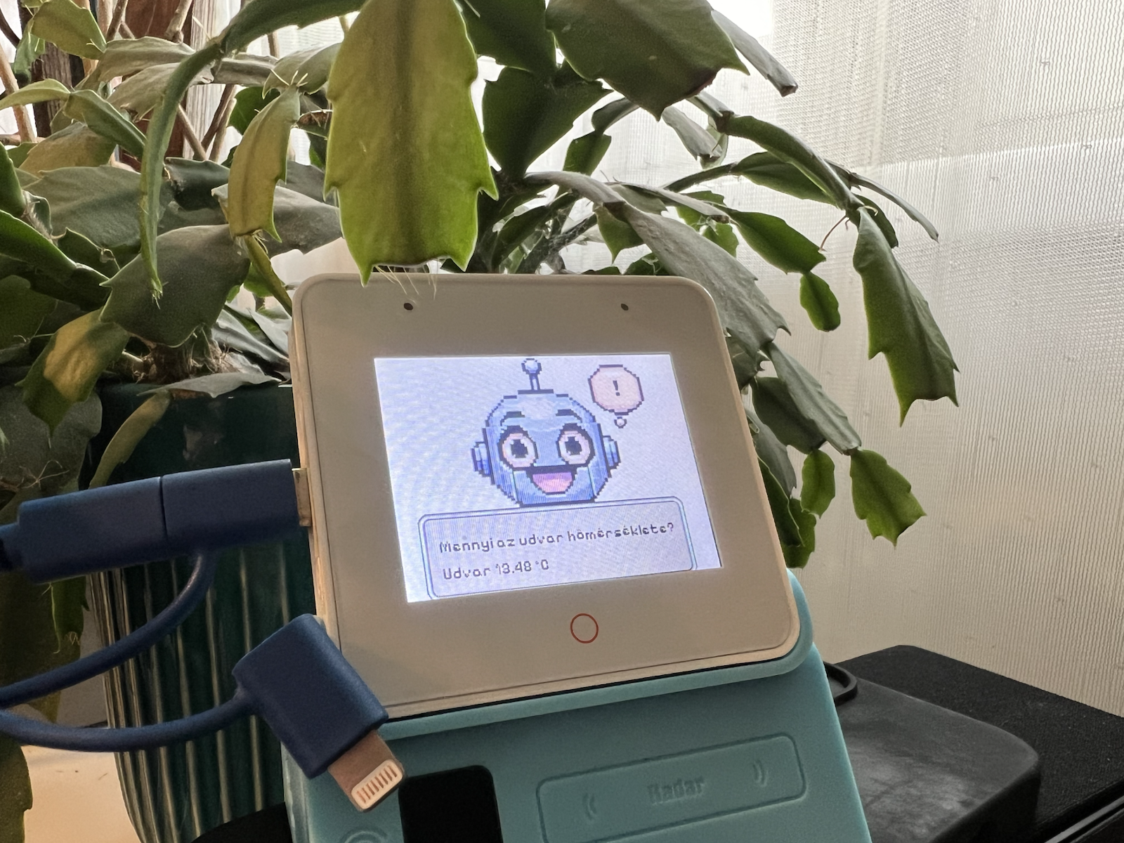 ESP32-S3-BOX-3 voice assistant with conversation text shown on screen